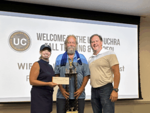 Pictured, from left: Holly Montooth, Public Transportation Director; Michael Smith, Driver; and Mark Farley, UCHRA Executive Director.